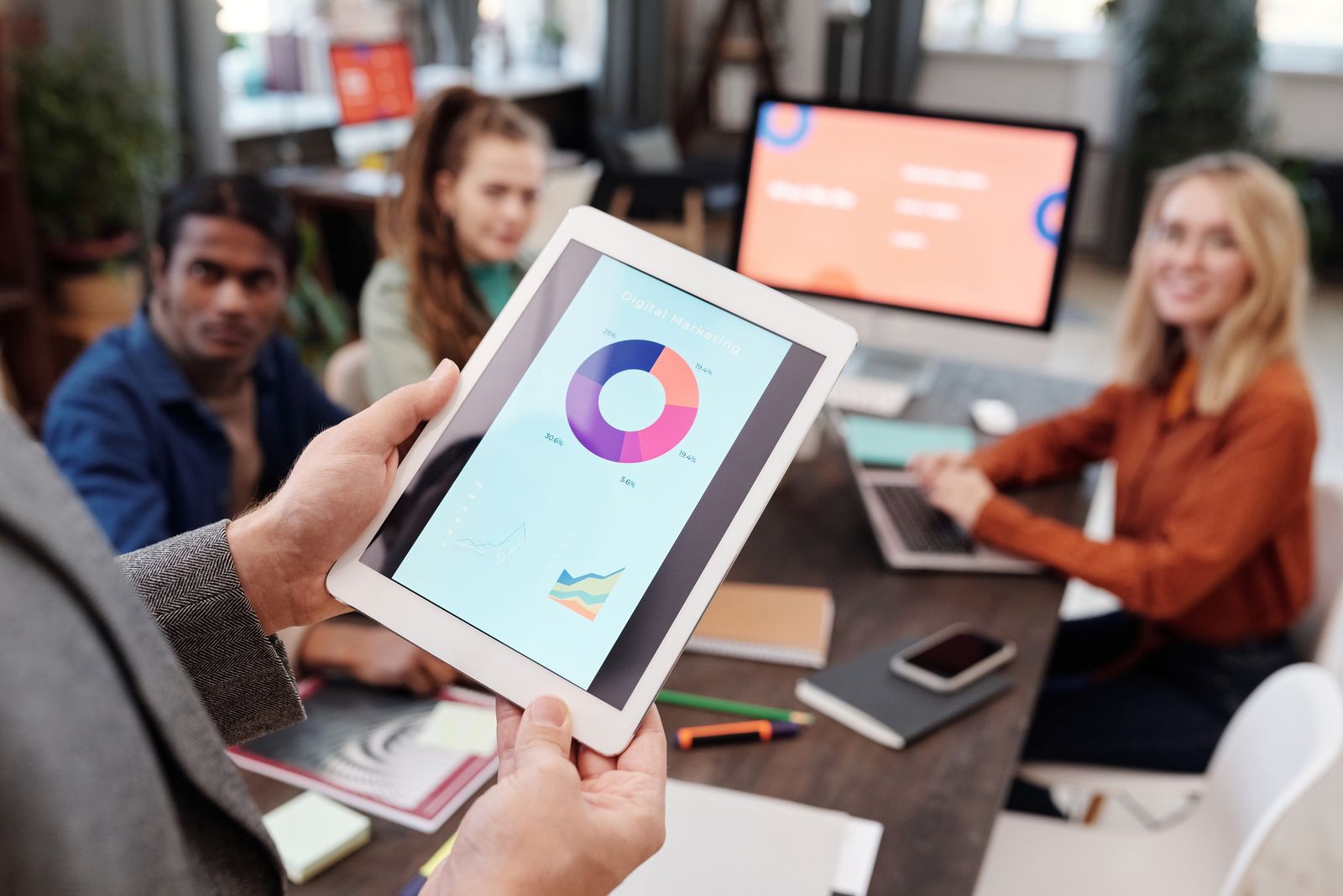 A marketing team reviewing advertising performance and analytics